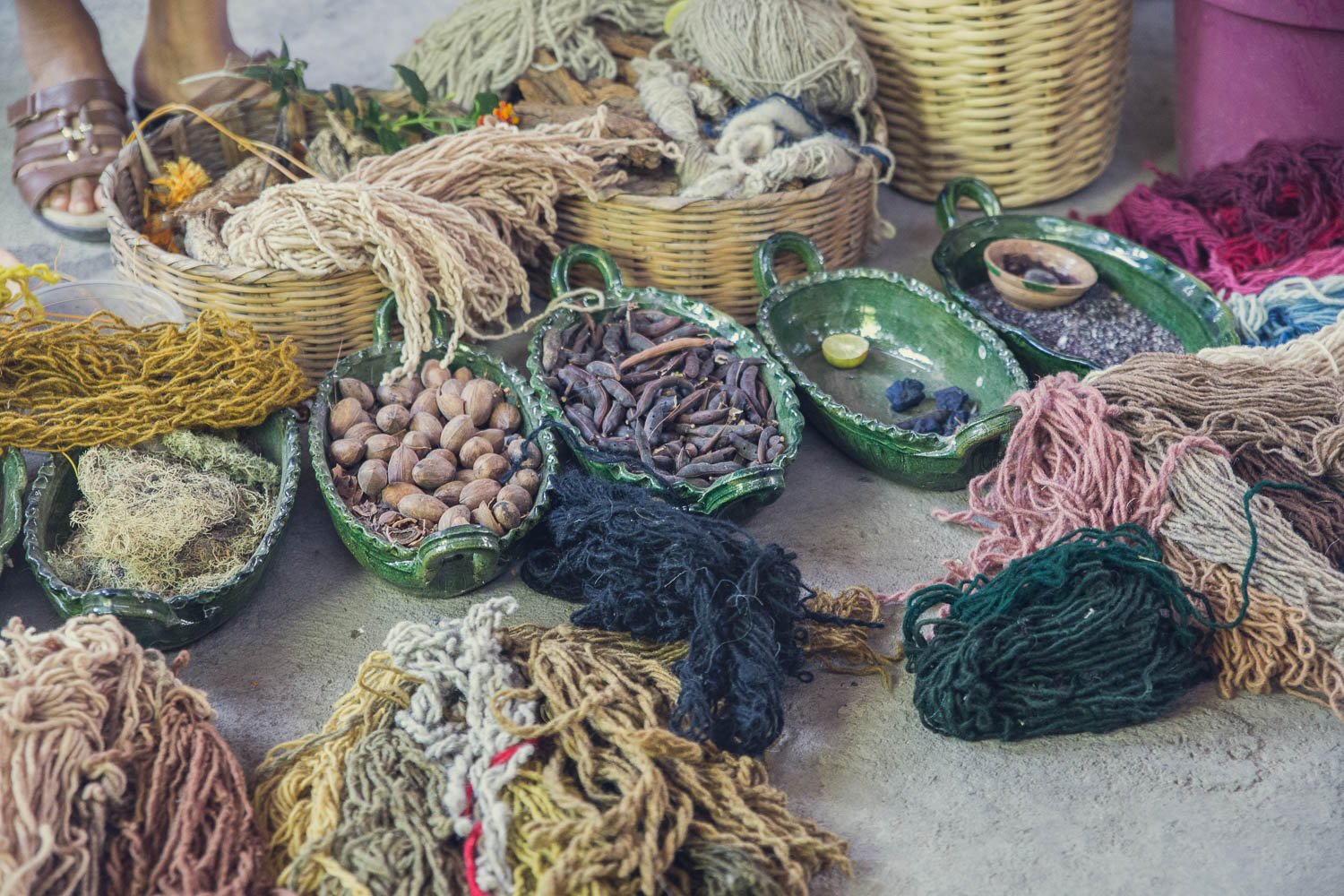 Assorted natural dyes they use to create different coloured threads.