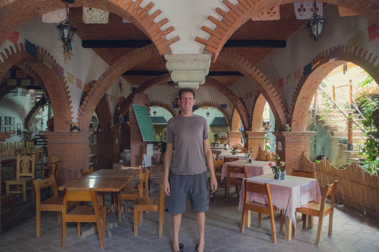 Here's Ben in his part-time gig holding up the ceiling in a restaurant in Teotitlán del Valle.